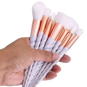 Professional 10pcs makeup brush set with spiral purple handles and white synthetic bristles