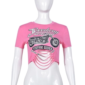 Detail of pink crop top featuring vintage motorcycle print and hollowed-out distressed hem