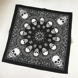 Classic cotton bandana featuring skull and paisley pattern in black and white finish