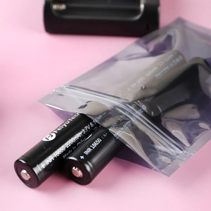 Close-up of 18650 lithium batteries with anti-static resealable packaging bags