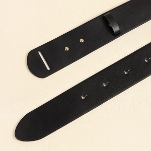 Vintage black leather belt for women featuring a metallic buckle and adjustable holes
