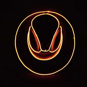 Detail view of black LED jazz hat with orange glowing EL wire for parties