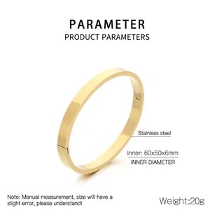 Close-up of polished gold stainless steel oval bangle with 60x50x6mm measurements