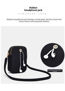 Detail of black canvas phone bag featuring a reinforced earphone hole on the back side