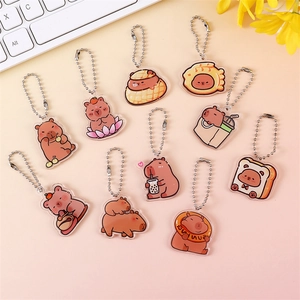 Set of 10 cute acrylic capybara keychains with various cartoon food and animal themes