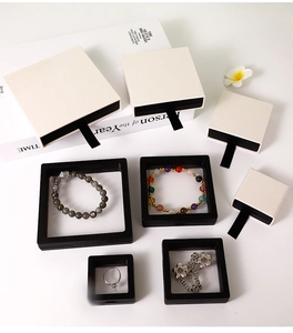 Close-up of floating 3D PE film jewelry box with white drawer packaging for rings