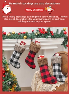 Detail of buffalo plaid Christmas stockings with plush trim hanging on a white fireplace
