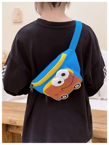 Rear view of a child wearing a blue nylon cross-body bag with 3D cartoon bus decoration