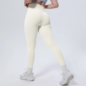 Detailansicht der High Waist Yoga-Leggings mit nahtlosem Shaping-Effekt in Cremeweiß
