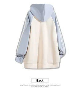Back view of a color-block hoodie featuring light blue raglan sleeves and cream white body
