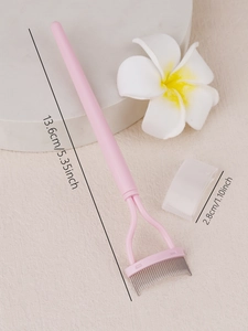 Detail showing pink stainless steel eyelash comb dimensions with clear protective cap