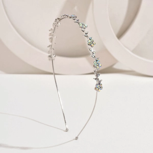 French vintage silver metal headband with colorful rhinestone flowers on white background
