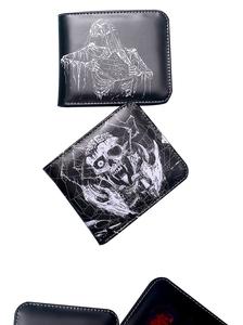 Detailed view of four black wallets with vintage skull and hooded figure prints