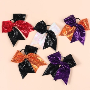 Lot détaillé de cinq chouchous à paillettes brillantes aux motifs de couleurs festives