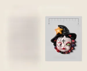 Macro detail of strawberry girl resin nail art charm with gothic witch hat and stars