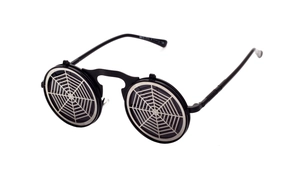 Detail view of round steampunk sunglasses with unique silver spider web flip-up lenses