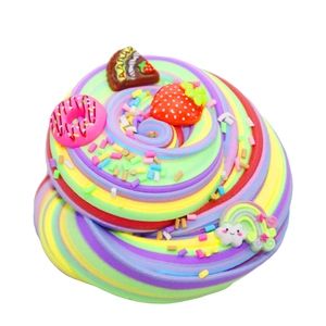 Rainbow butter slime for kids with colorful cake, strawberry, and donut charms