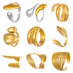 Detail view of nine 18K gold and silver plated stainless steel lava geometric rings
