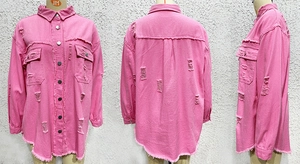 Detailed views of rose pink distressed denim jacket with raw hems and ripped textures