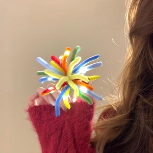 Colorful LED pipe cleaner firework hair clip with vibrant glowing fiber tassels