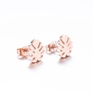 Minimalist rose gold monstera leaf stud earrings with hollow plant design for women