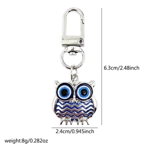 Detailed dimensions of silver owl keychain with blue evil eye enamel charm