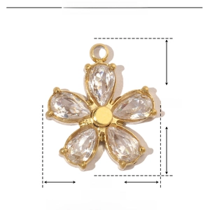 Detail view of 15x13mm gold flower pendant with teardrop zircons and size annotations