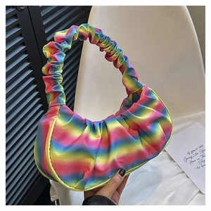 Detailed shot of pleated rainbow shoulder bag with vibrant gradient silk texture