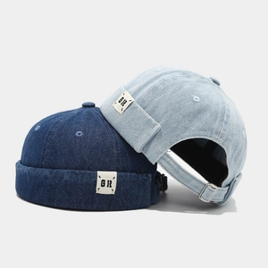 Vintage denim docker hats in light and dark blue with GR patch and metal buckle