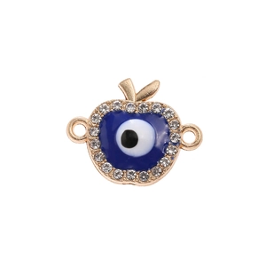 Macro shot of evil eye apple connector with gold plating and pave-set rhinestones