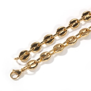 Polished gold coffee bean link chain necklace with lobster clasp in a minimalist style