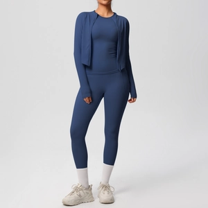 Three-piece navy yoga set featuring high-waist leggings and zipper jacket for fitness