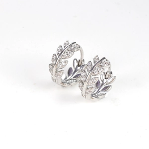 Sparkling olive leaf hoop earrings with white zircon crystals in polished silver finish