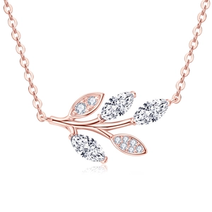 Rose gold leaf pendant necklace with D color moissanite stones on a delicate chain