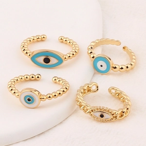 Minimalist evil eye rings in gold finish with blue enamel and sparkling rhinestones