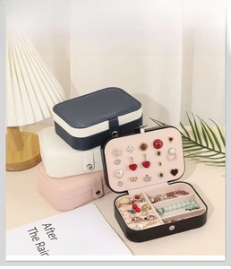 Detail of multi-color double-layer PU leather jewelry boxes with metal snap button closures