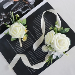 Wedding bridal corsage and wristlet set with cream roses, silk ribbons, and greenery