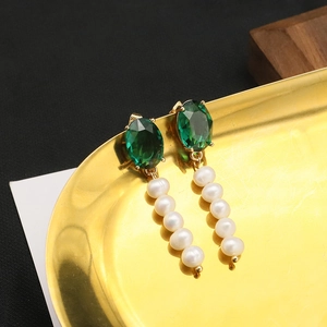 Elegant gold drop earrings featuring a deep green gemstone and five natural white pearls