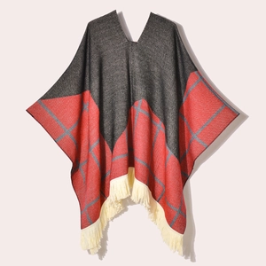 Women's charcoal and red jacquard tassel poncho with knit plaid pattern and V-neck