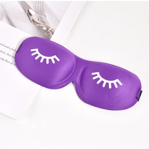Detail of purple 3D sleep mask with white eyelash print and adjustable elastic strap