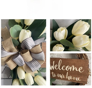 Close-up of farmhouse tulip wreath with Welcome to our home wooden sign and burlap bow