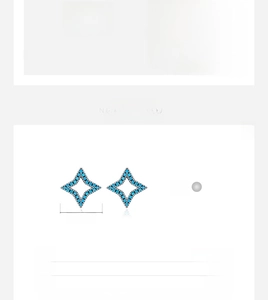 Macro detail of S925 sterling silver star stud earrings featuring inlaid blue gemstones
