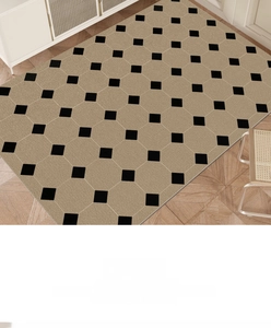 Detailed texture of French retro geometric PVC doormat on chevron wood floor
