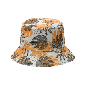 Detail of vibrant tropical banana leaf print and precise stitching on sun bucket hat