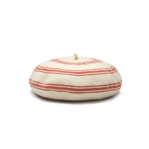 Minimalist cream knit beret featuring vibrant orange-red stripes and fine wool texture