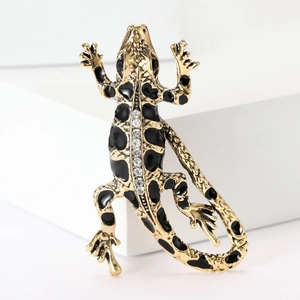 Vintage gold lizard brooch with black enamel spots and sparkling crystal rhinestones