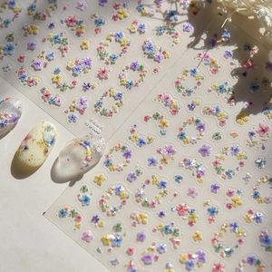 Detail shot of TO-5100 3D embossed floral nail stickers with colorful spring flower designs