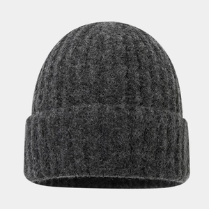 Close-up of charcoal gray knit beanie featuring premium fuzzy wool texture and ribbed cuff