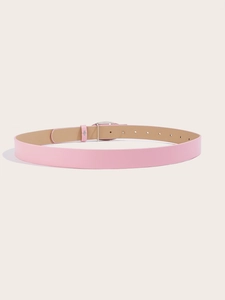 Detail view of pink faux leather belt showing silver metal buckle and adjustment holes