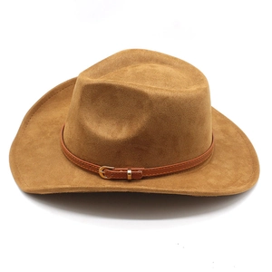 Close-up of camel faux suede western cowboy hat with brown leather belt and gold buckle